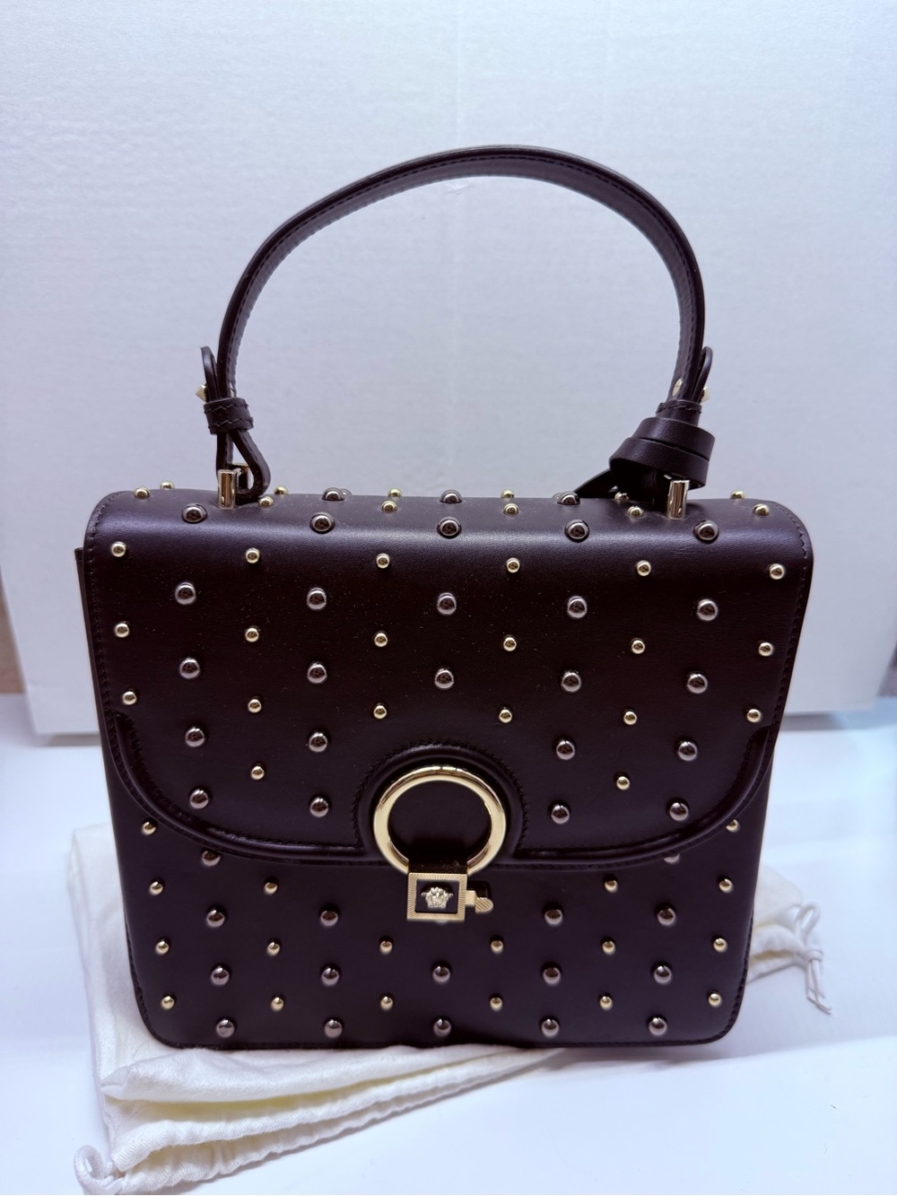 Versace DV One studded top handle bag